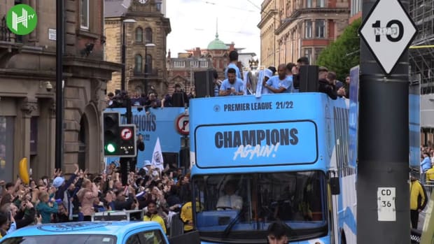Man City take Premier League trophy on bus parade